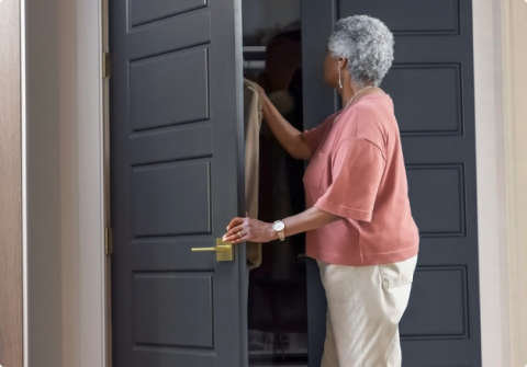 Woman opening Schlage door